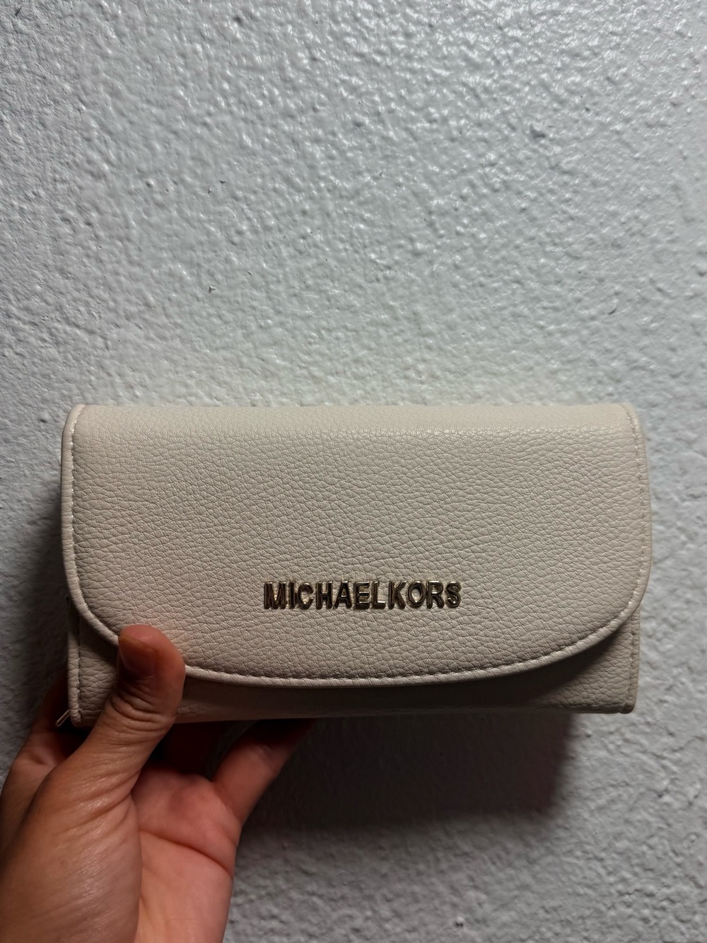 “MK” Cream Pebbled Leather Fold-Over Wallet with Gold Logo